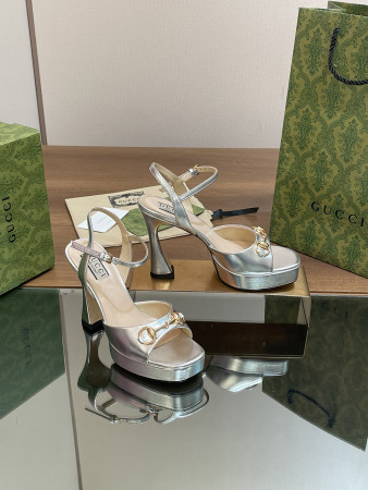 ua G*u*i women's horsebit platform sandal