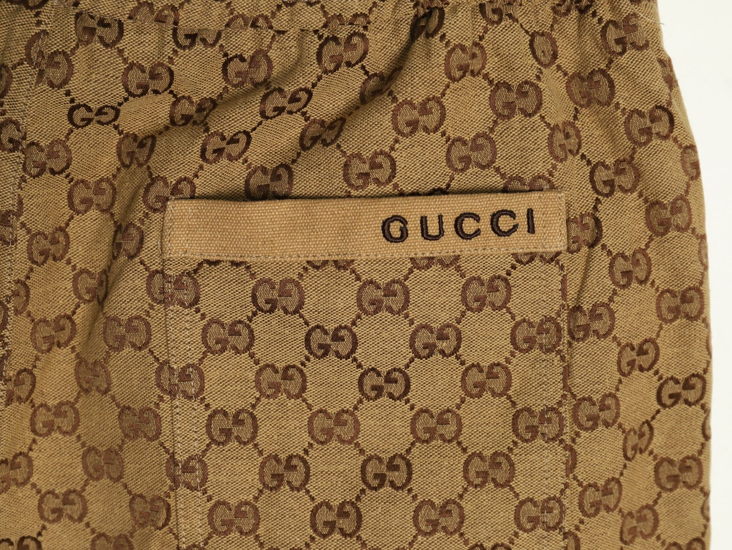 G*u*i shorts