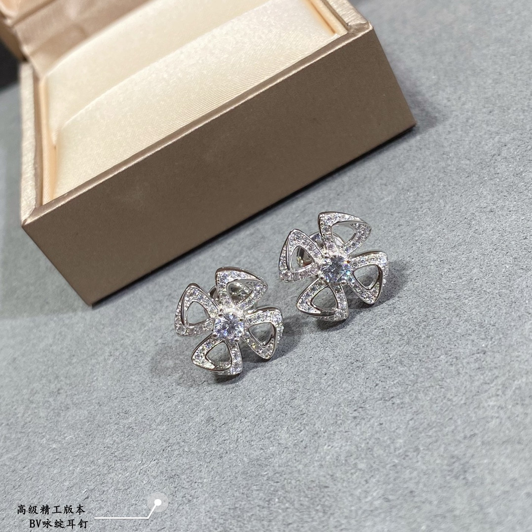 B*l*ai earrings