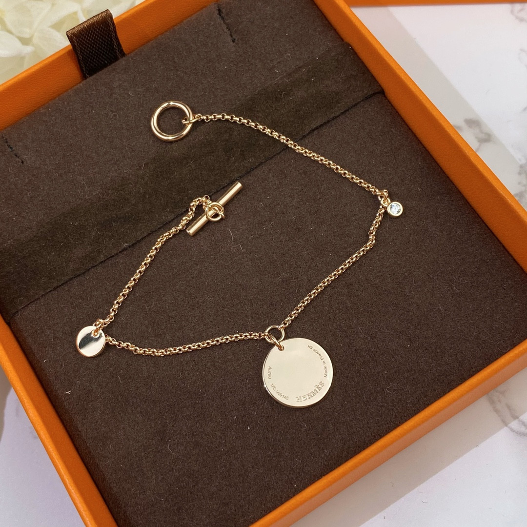 H**mes coin bracelet