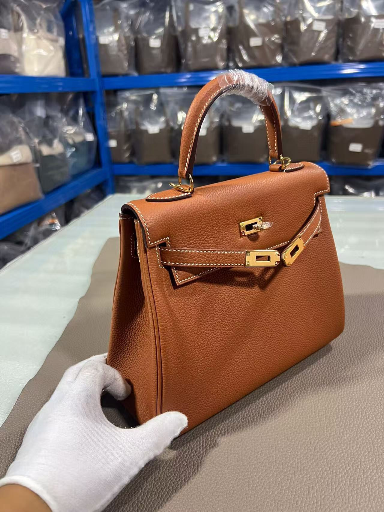 H**mes togo kelly gold-tone hardware 25
