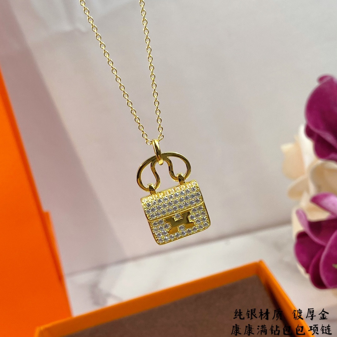 H**mes fully di*m*nd-encrusted h bag necklace