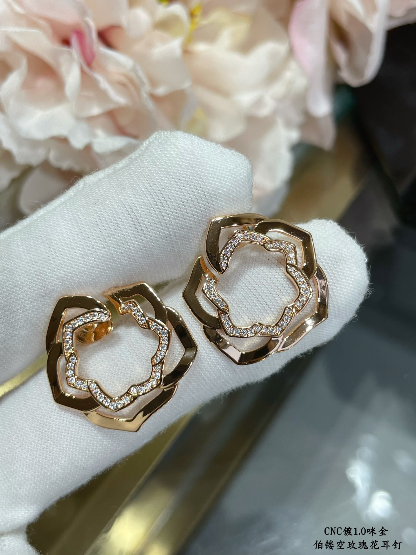 P1aget hollow rose earrings