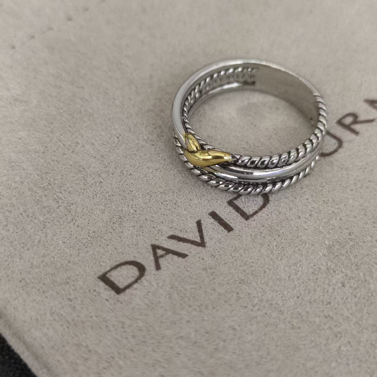 dau1d Yvrm*n x crossover band ring
