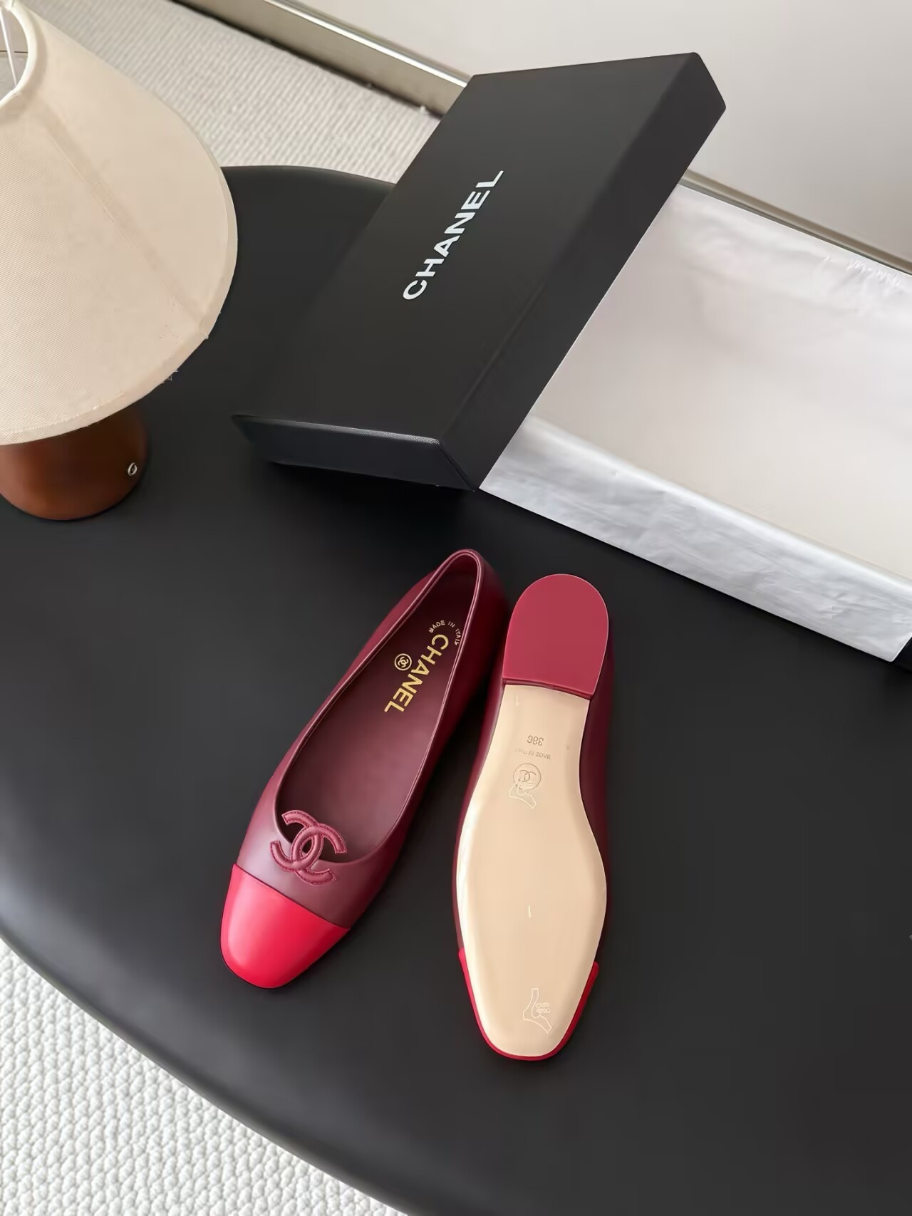 ua Ch*el leather ballet flats