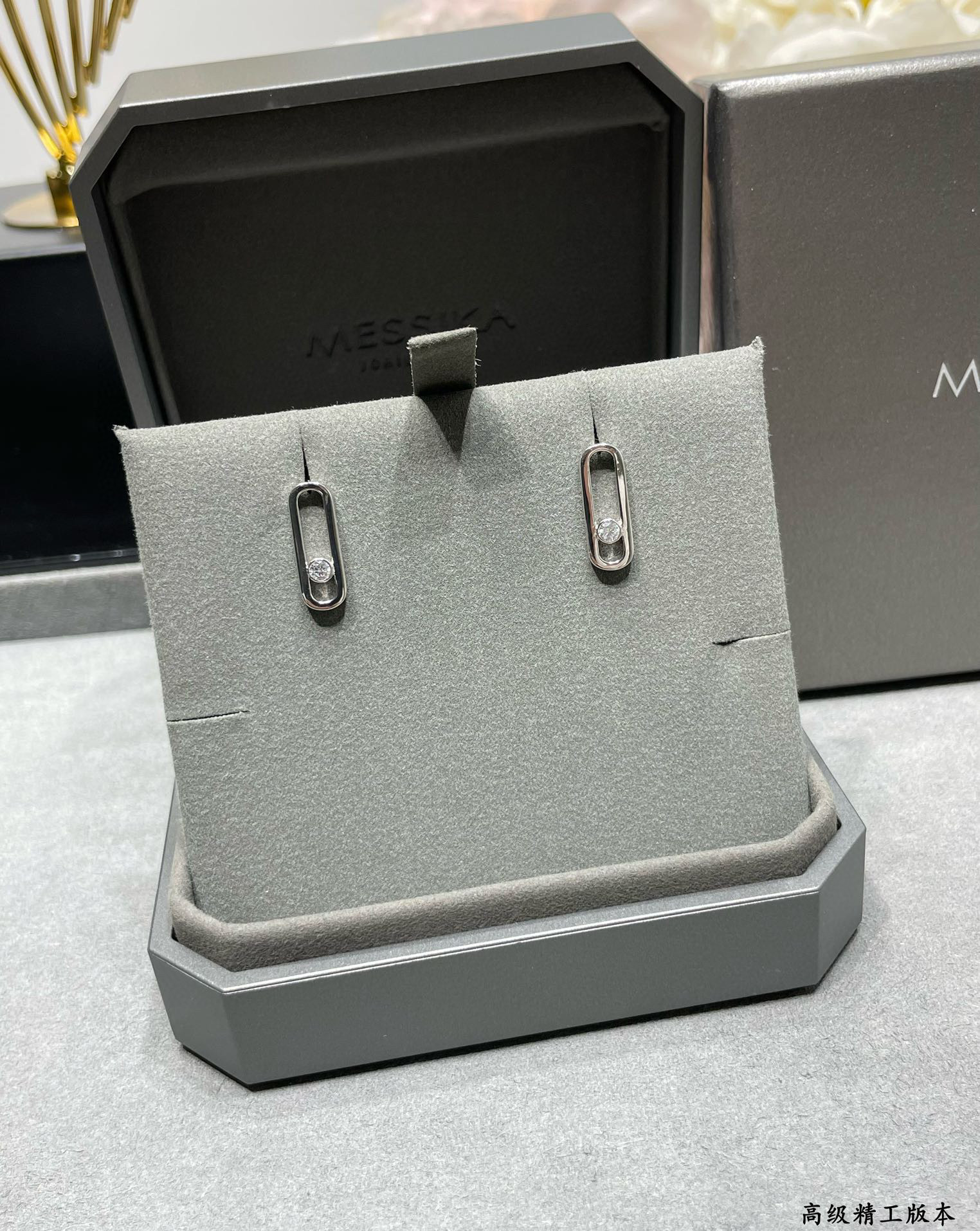 Mes1kaa stud earrings