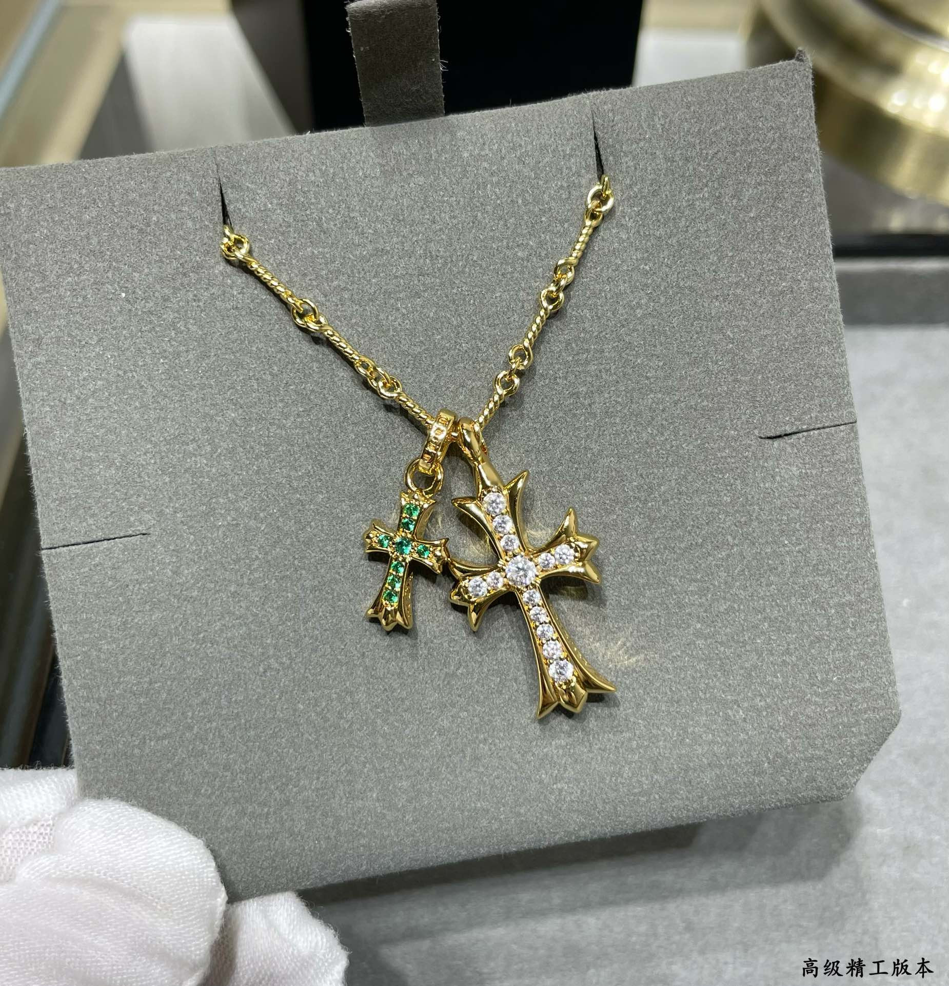 Ch*0me heart double cross green di*m*nd necklace