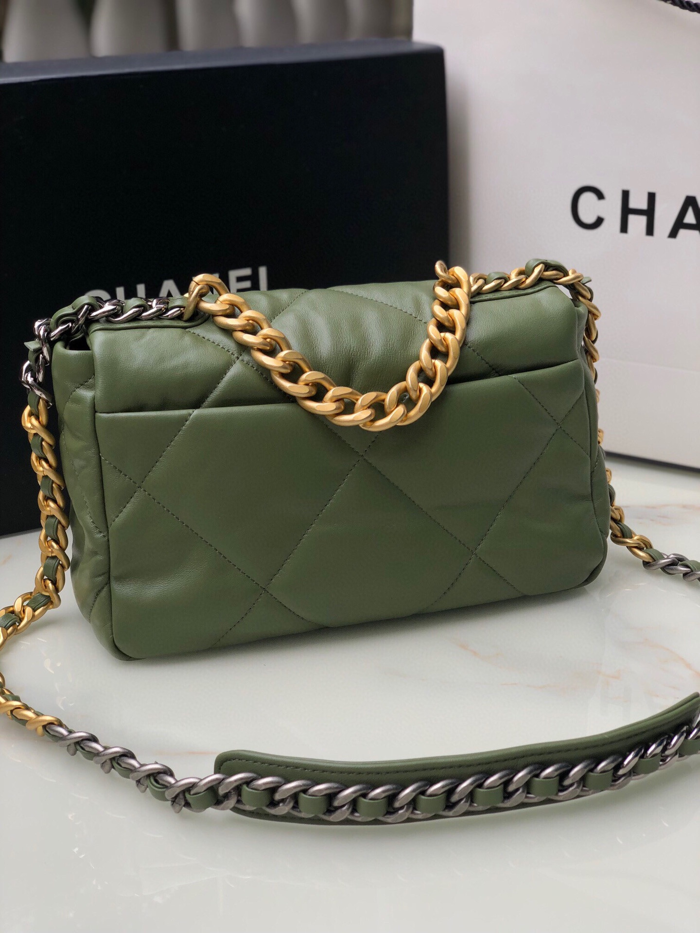 Ch*el 19 handbag shiny leather, gold-tone 16×26×9cm