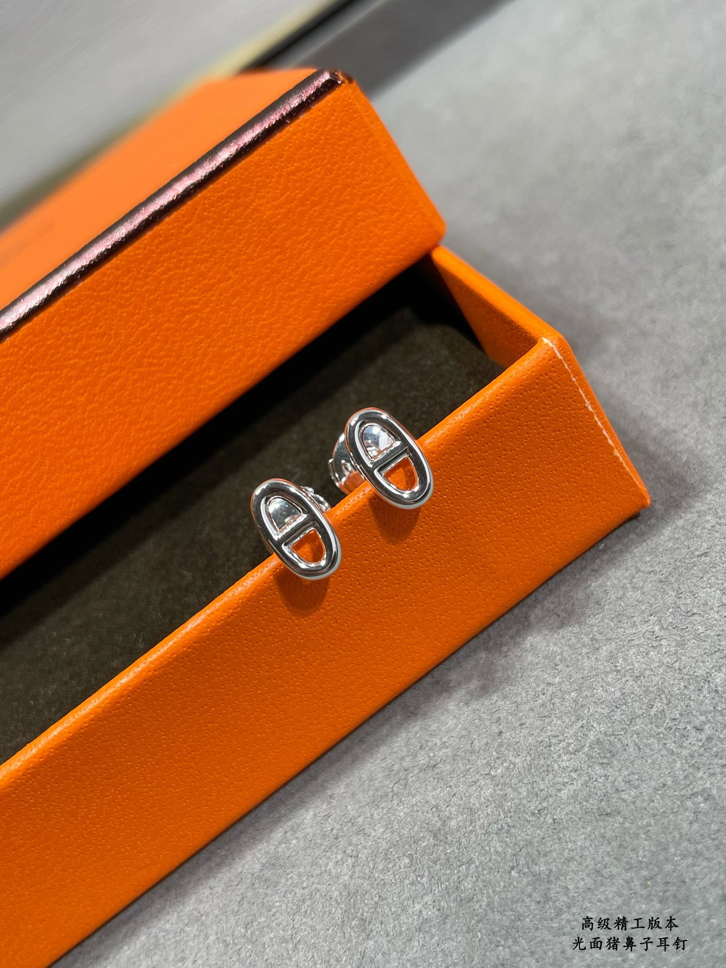 H**mes pig nose stud earrings