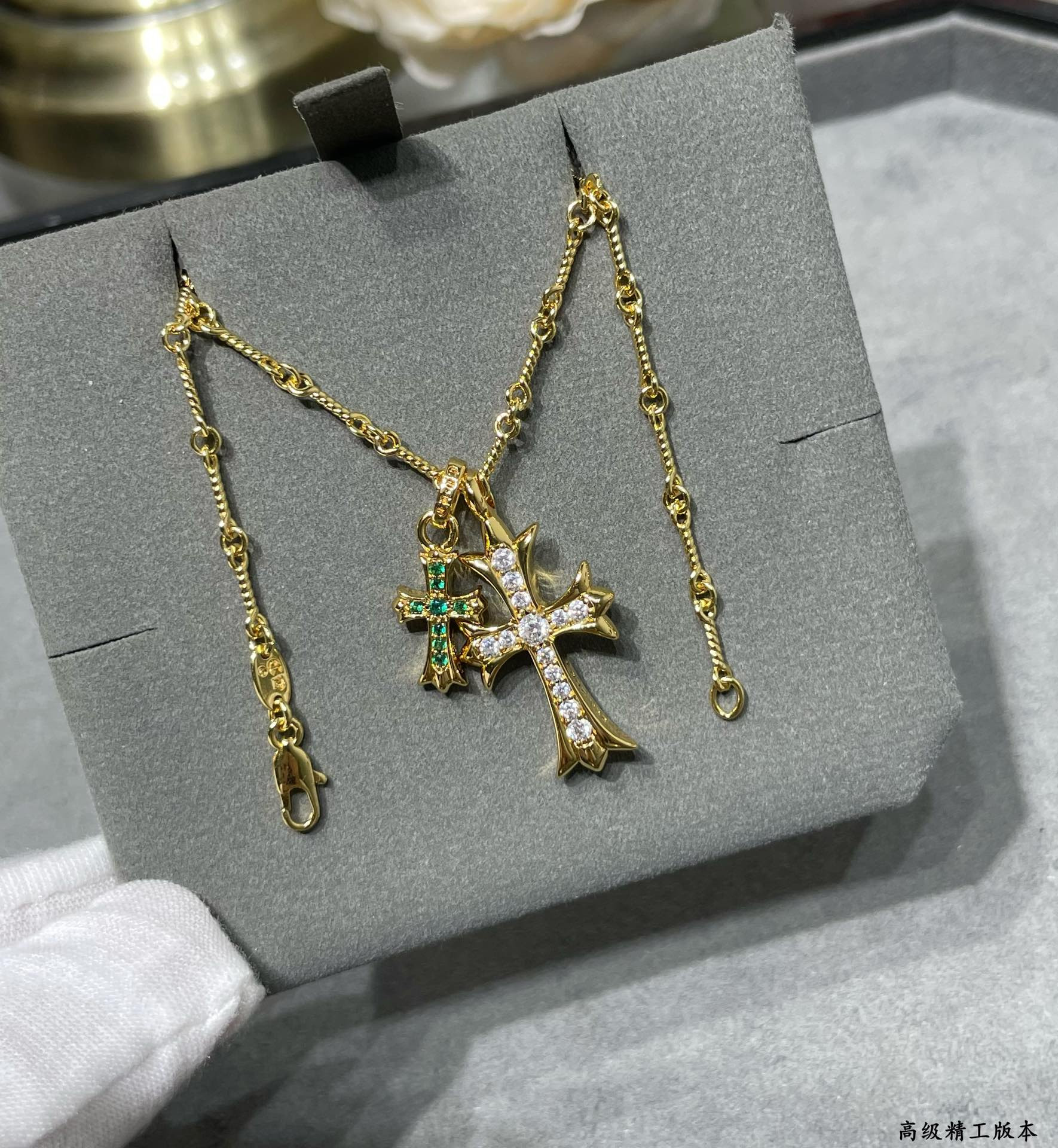 Ch*0me heart double cross green di*m*nd necklace