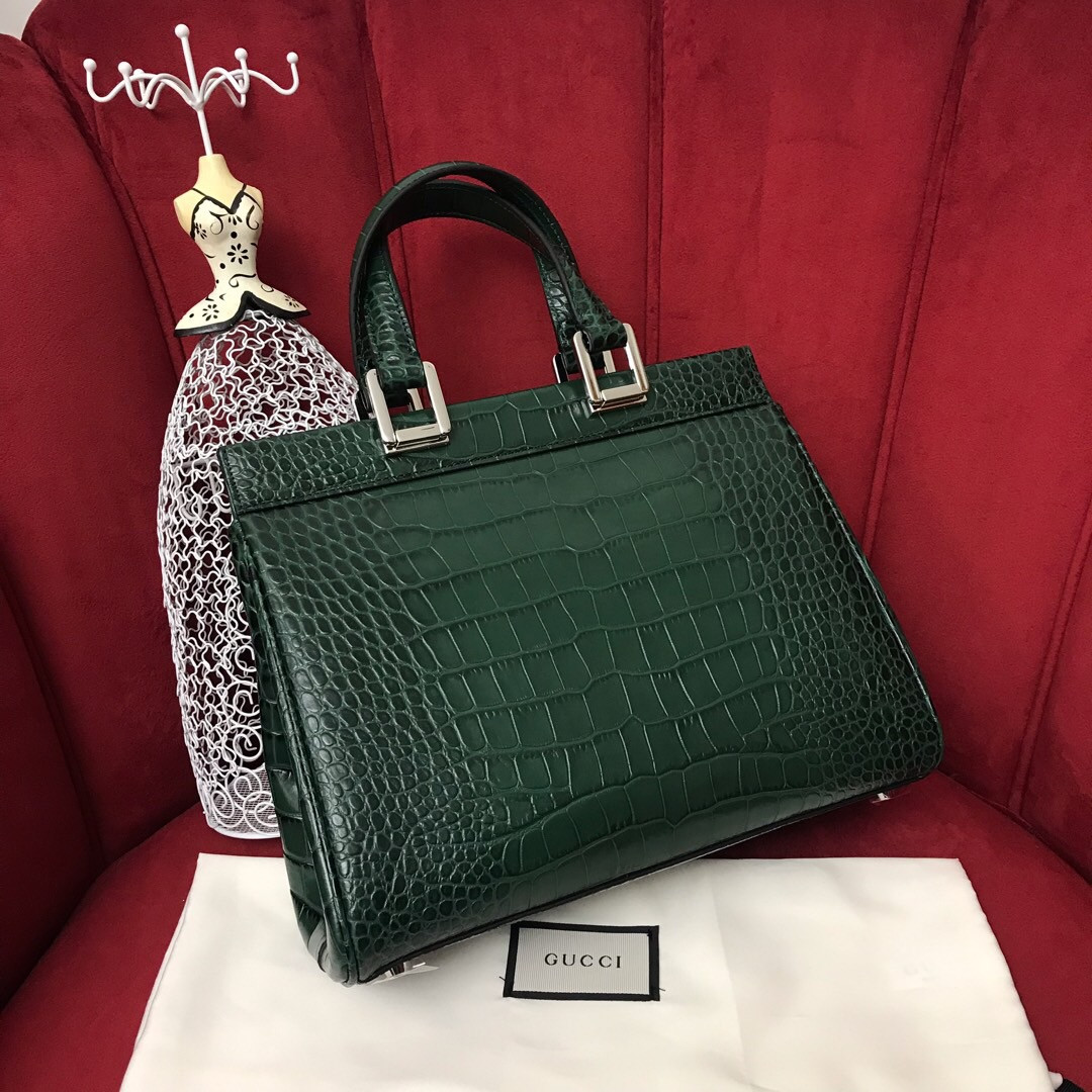 G*u*i zumi leather medium top handle bag