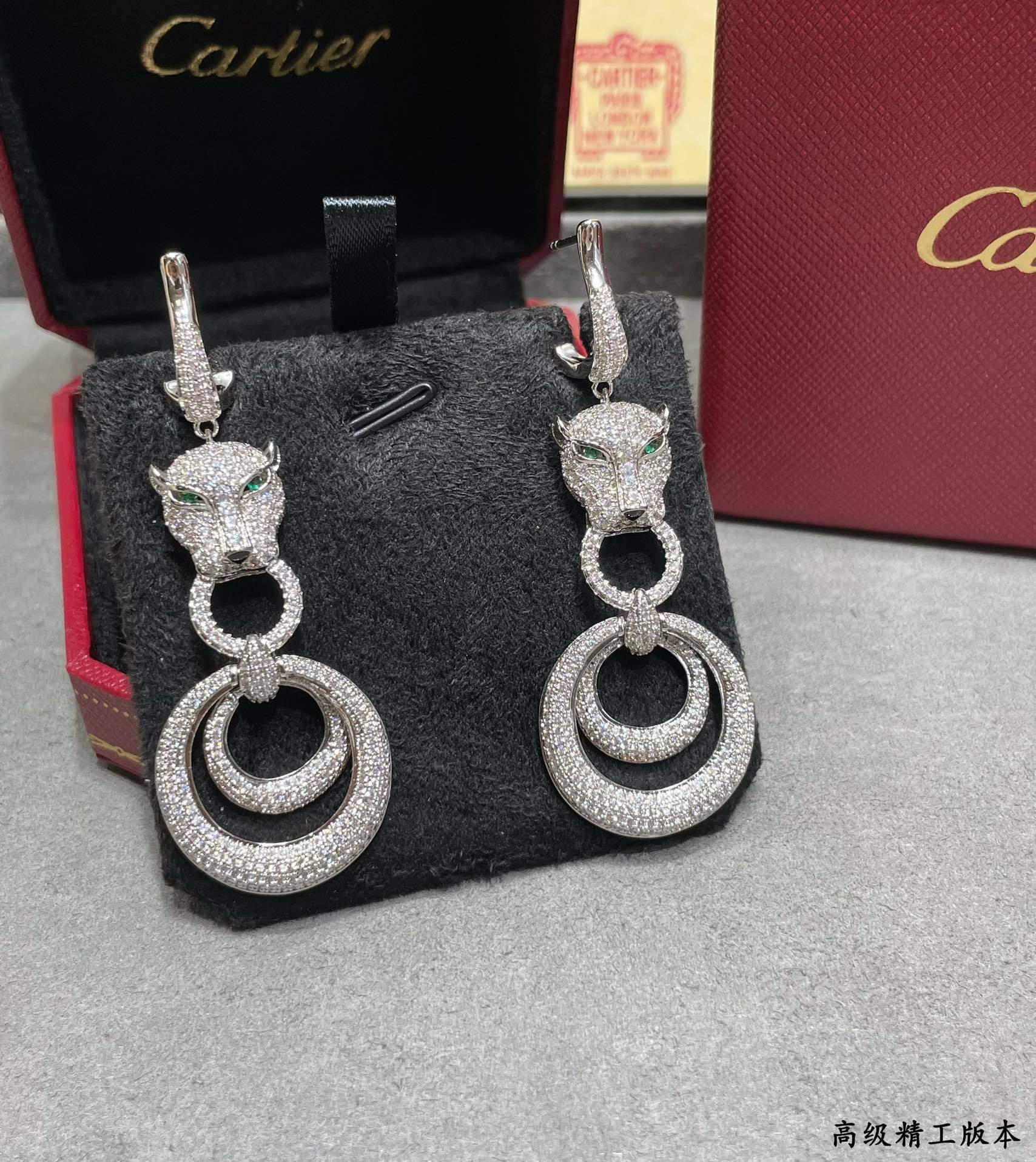 ca*t*er leopard full Di*m*nd earrings