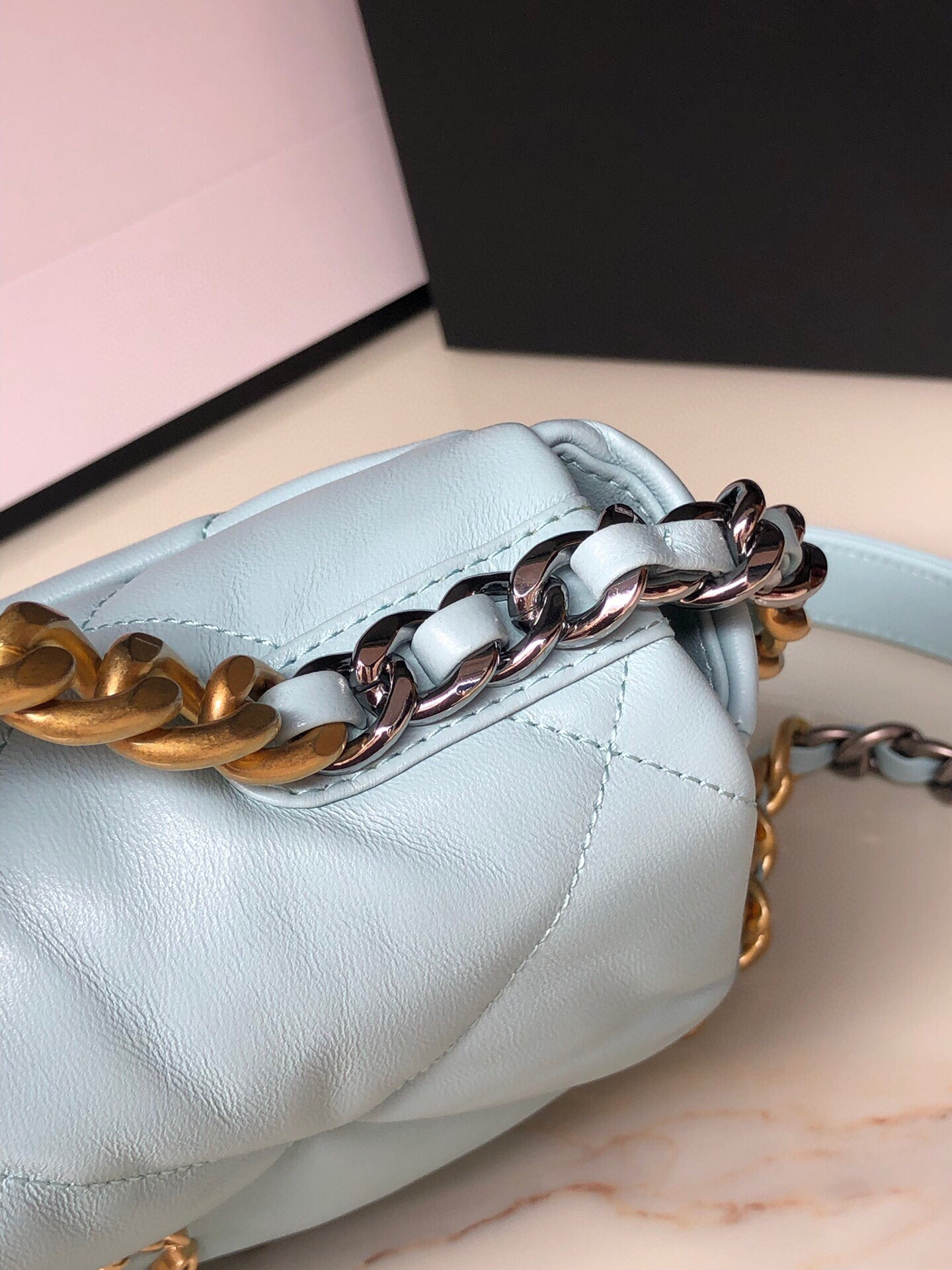Ch*el 19 handbag shiny leather, gold-tone, silver-tone & ruthenium-finish metal light blue 6.2 × 10.1 × 3.5 in