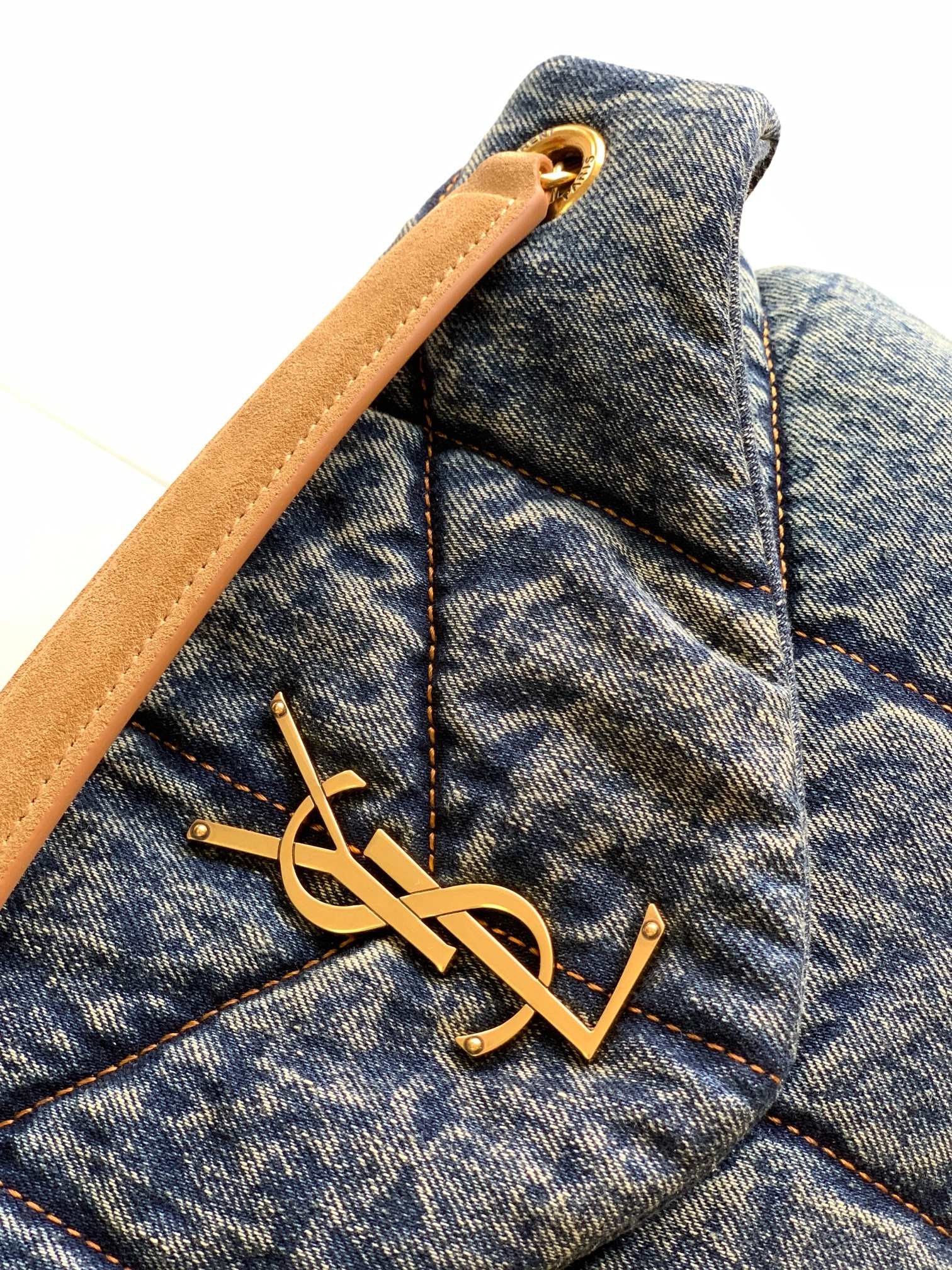 y*l puffer small in suede and De*1m rodeo blue 11.4 x 6.6 x 4.3 inches