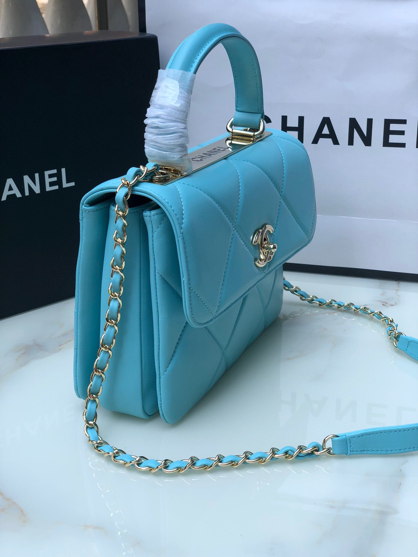 Ch*el flap bag with top handle 6.6 × 9.8 × 4.7 in