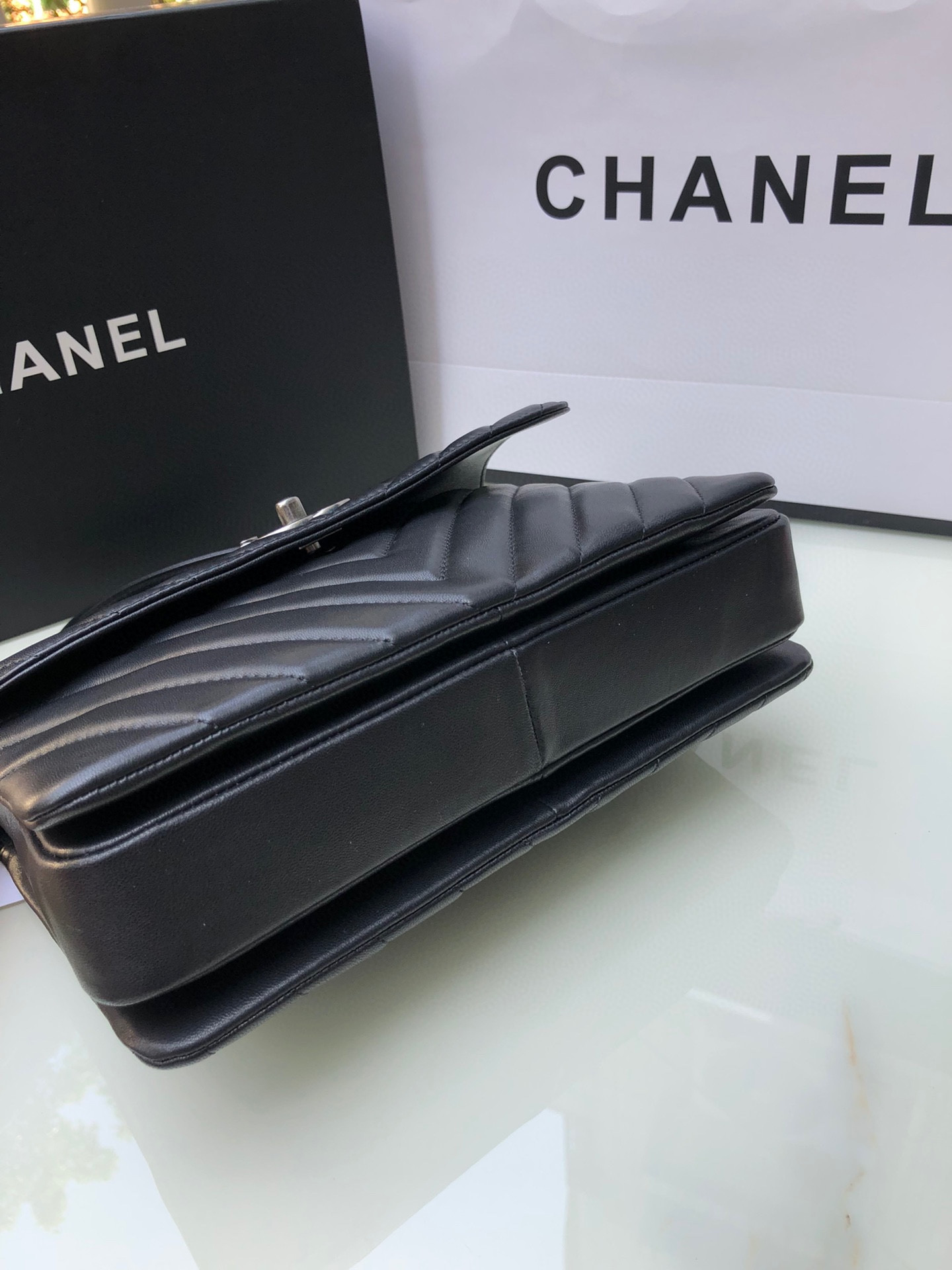 Ch*el flap bag with top handle 6.6 × 9.8 × 4.7 in