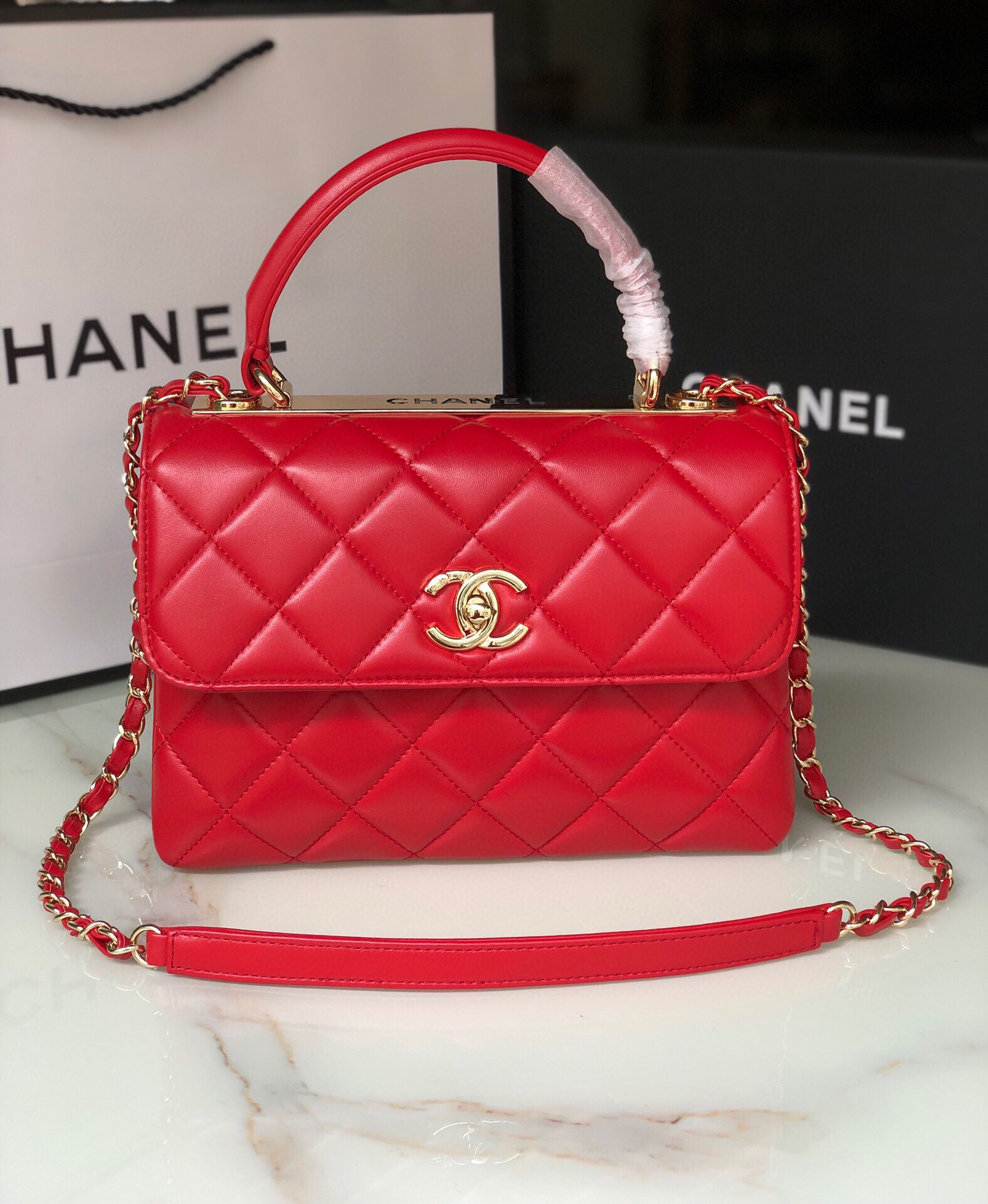 Ch*el flap bag with top handle 6.6 × 9.8 × 4.7 in