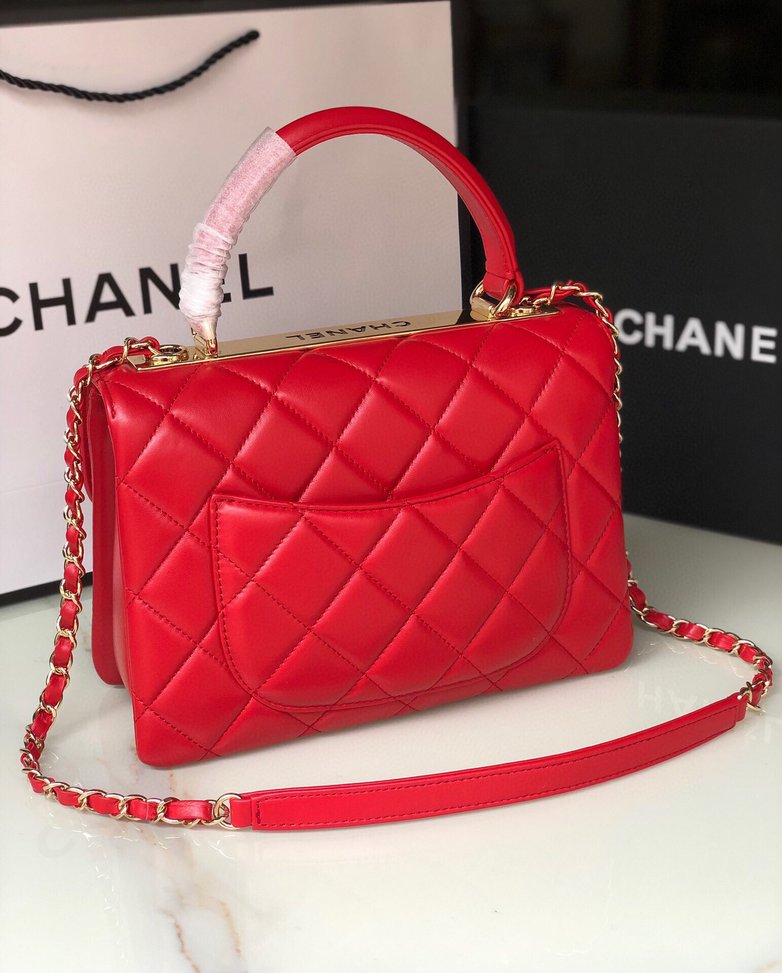 Ch*el flap bag with top handle 6.6 × 9.8 × 4.7 in