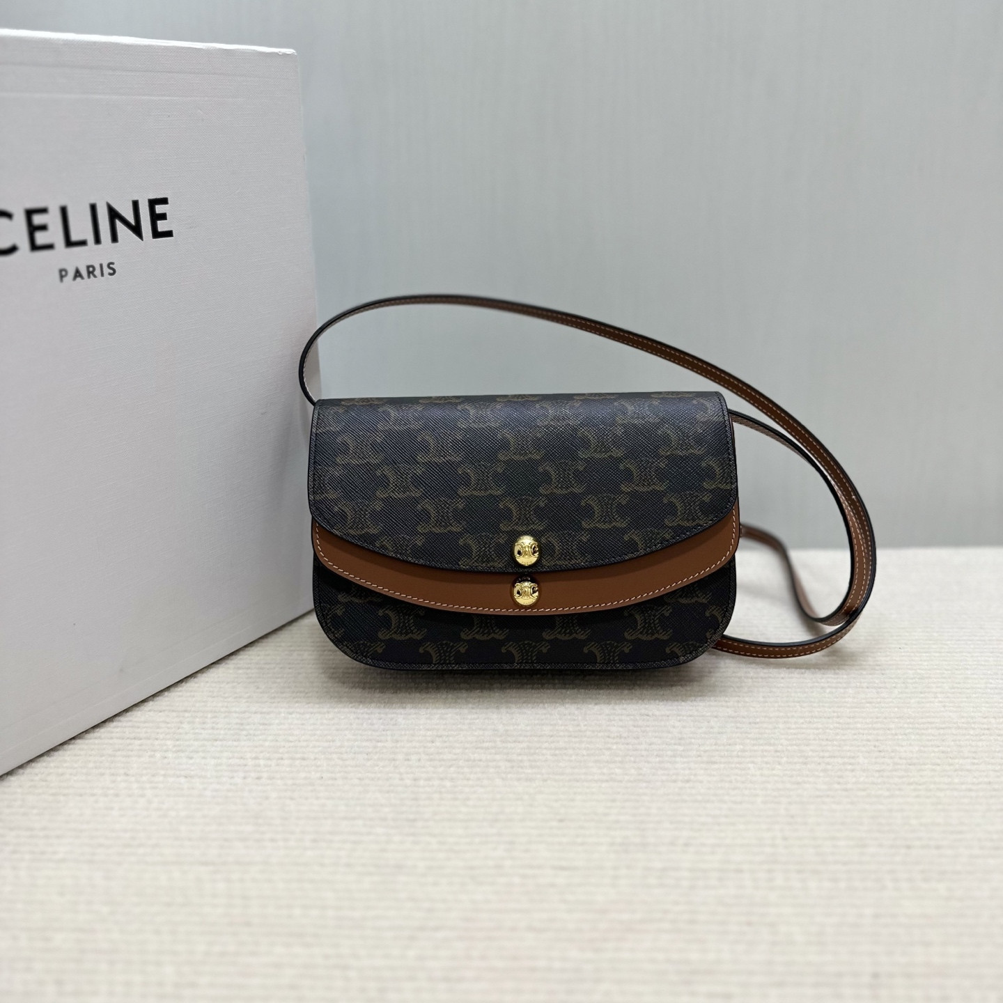 Ce**e duo wallet on strap in triomphe canvas and calfskin 20x13x6cm