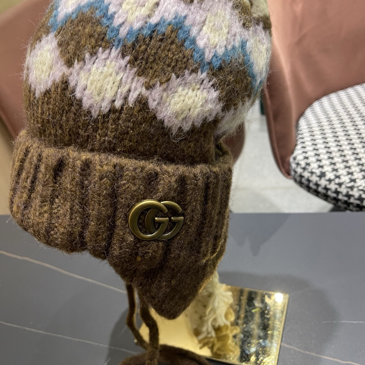 G*u*i knit trapper hat